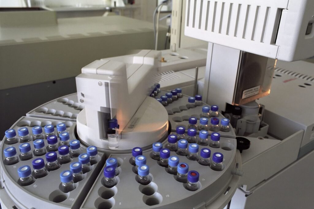 High Tech Laboratory Equipment With Multiple Vials In A Scientific Research Facility.